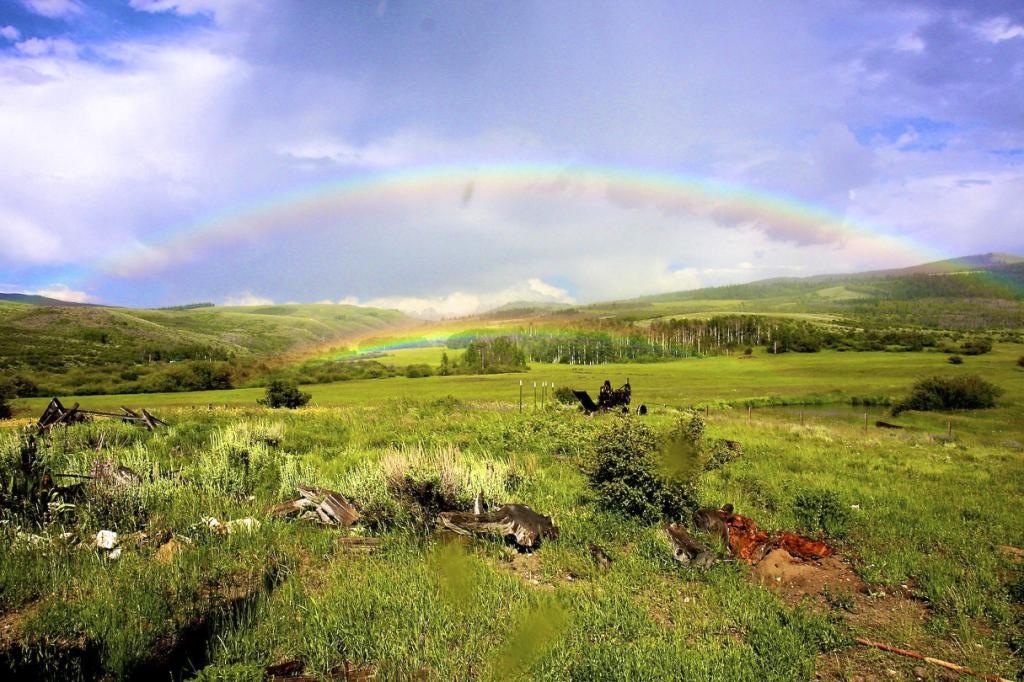 Full rainbow over the ranch valley